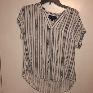 Vertical navy and cream striped shirt